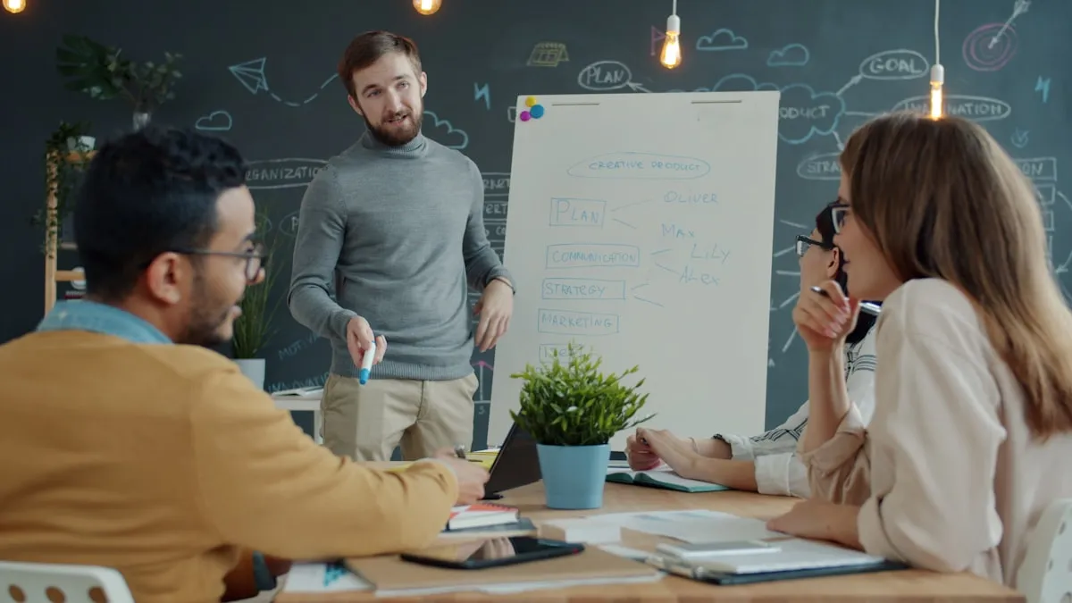 Project team gathered around a whiteboard listing strategy, communication, and named stakeholders during a planning meeting